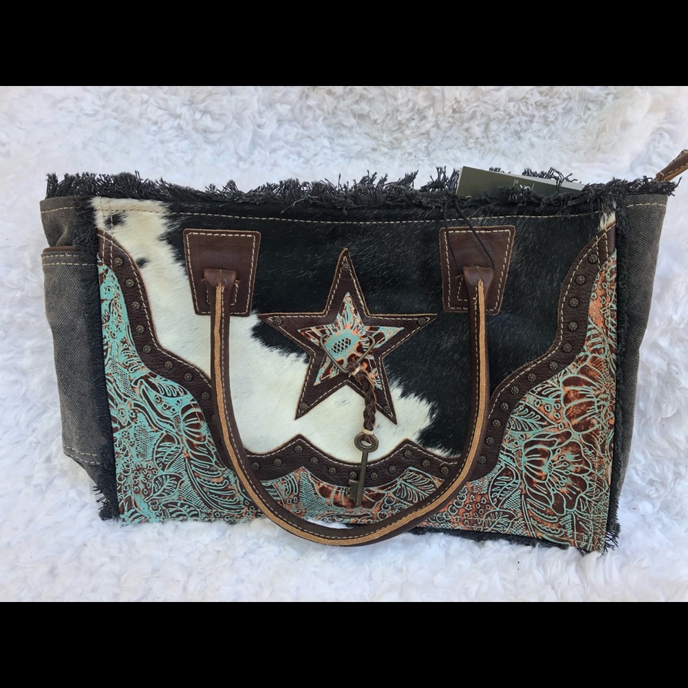 Cowhide fur canvas bag by myra